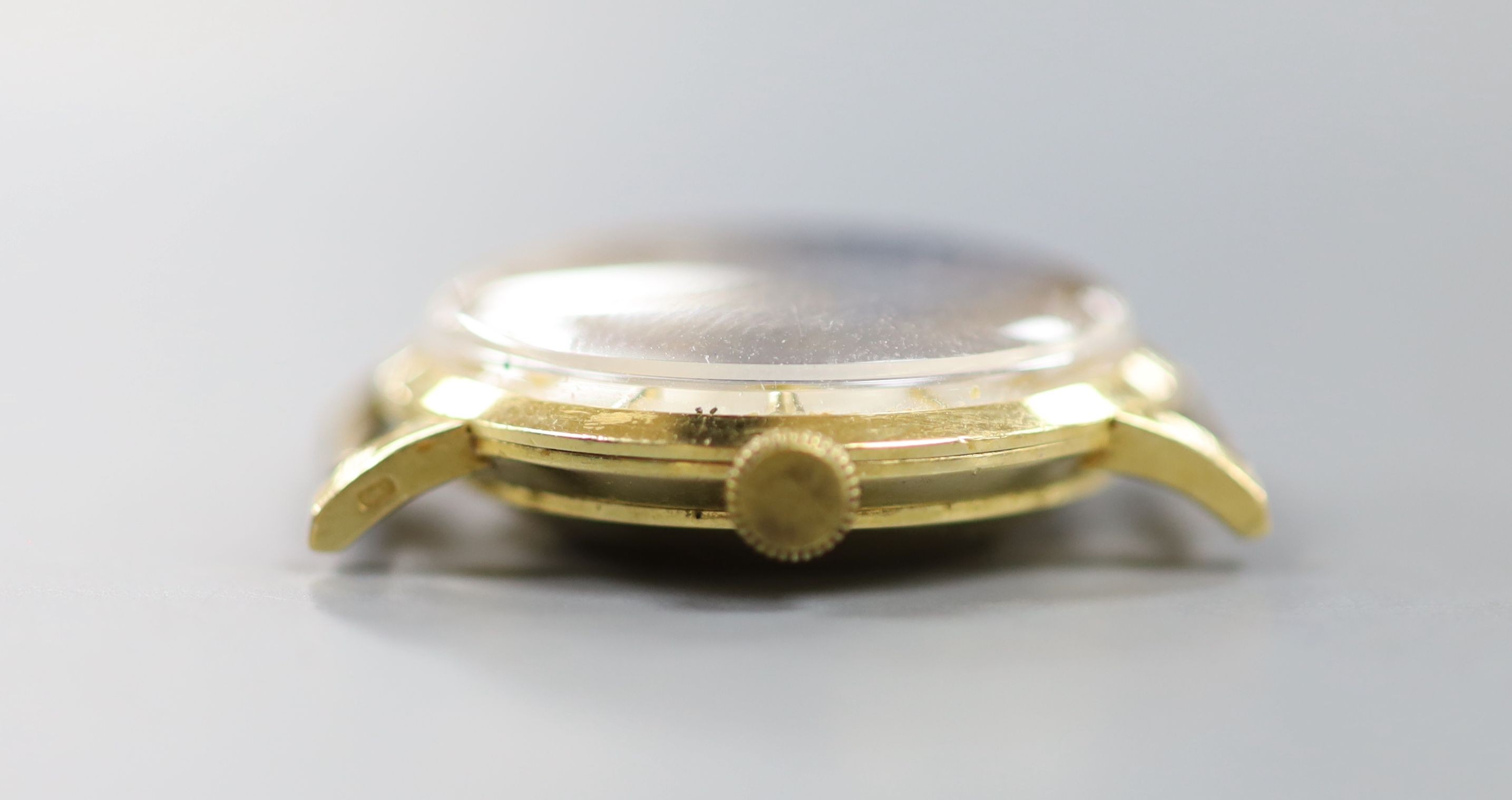 A lady's modern 18k Bucherer automatic wrist watch, no strap, case diameter 26mm, gross weight 16.4 grams.